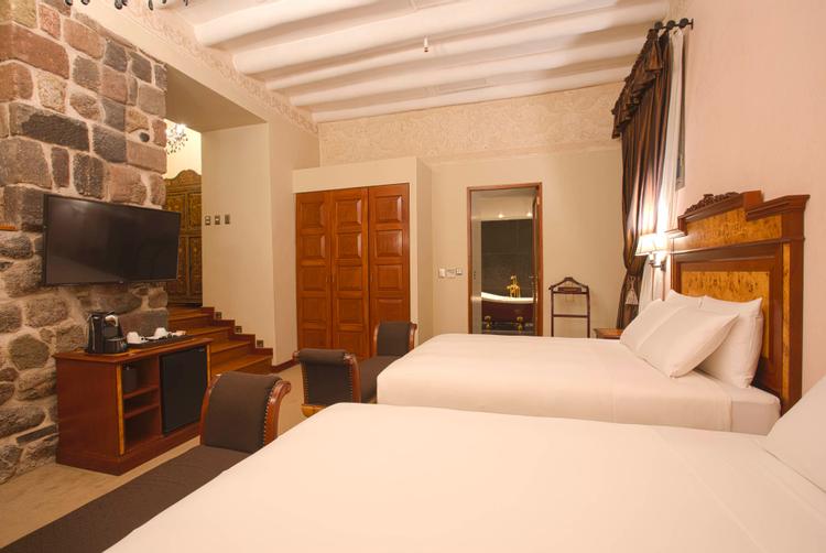 aranwa-cusco-junior-suite-01 Junior Suite Twin Room på Aranwa Cusco Boutique Hotel.